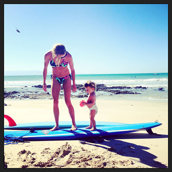 Kaiulani Cole & Daughter Kaiulani Cole teaching her daughter to surf